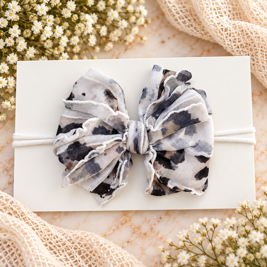 White Leopard | Skinny Mini Nylon Ruffled Baby Headband